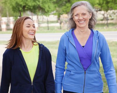Mother and daughter walking